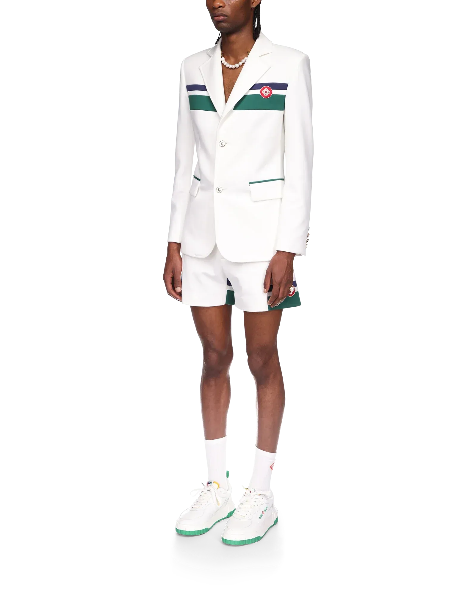 Model wearing Casablanca sports tailoring jacket with tailored trousers