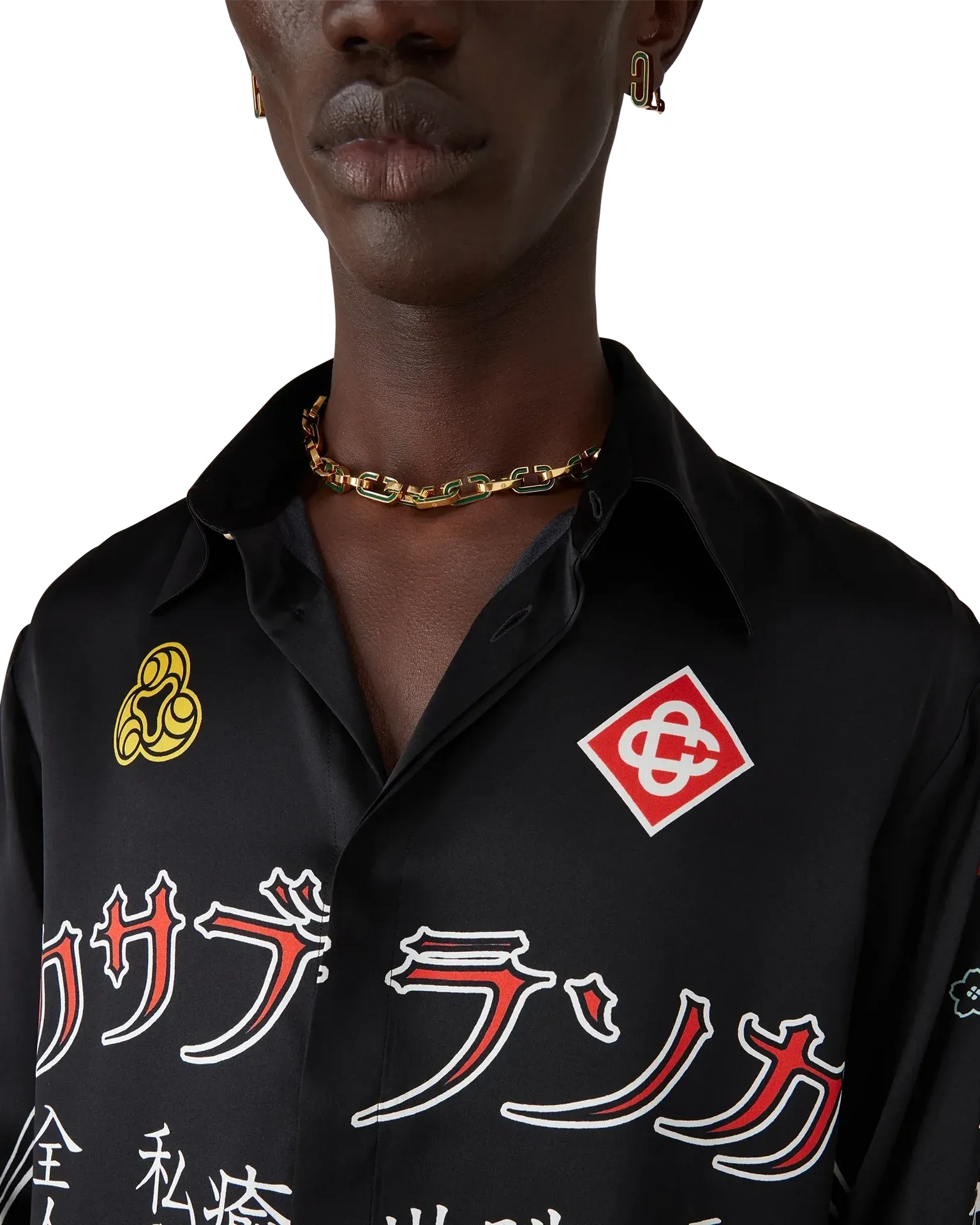 Close-up of corozo and gold rim enamel buttons on Emblem Silk Satin Shirt