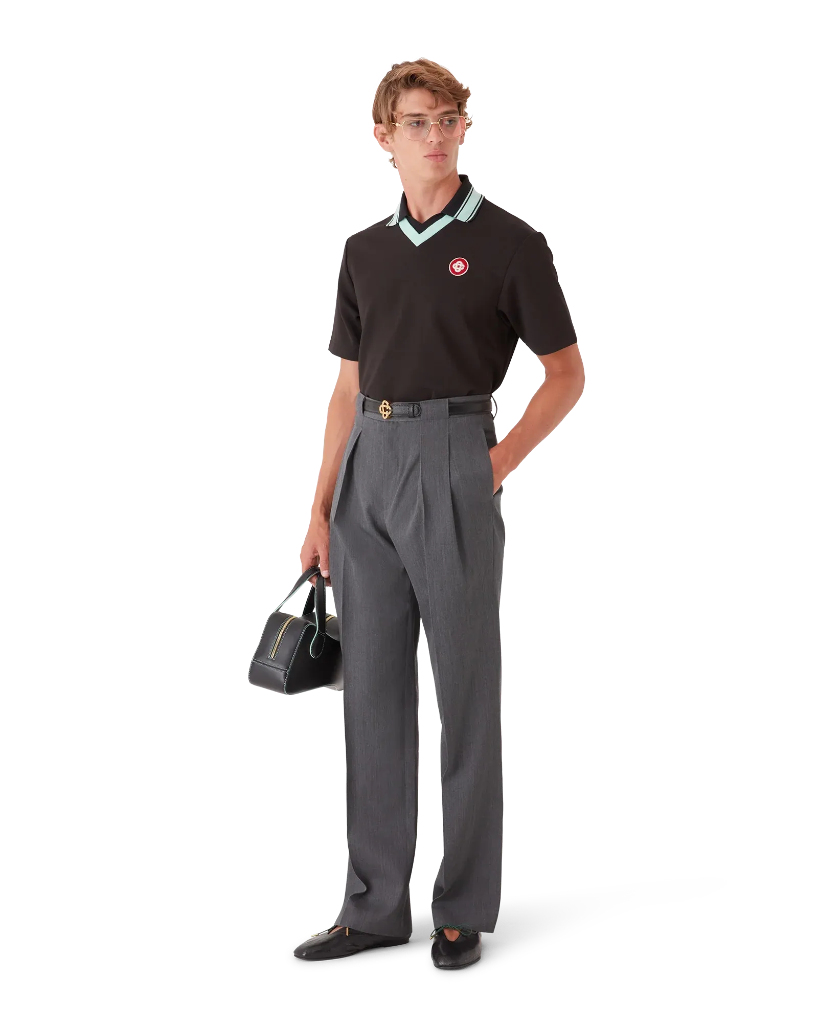 Model wearing grey Wool Tailoring Belt Loop Trousers in relaxed fit