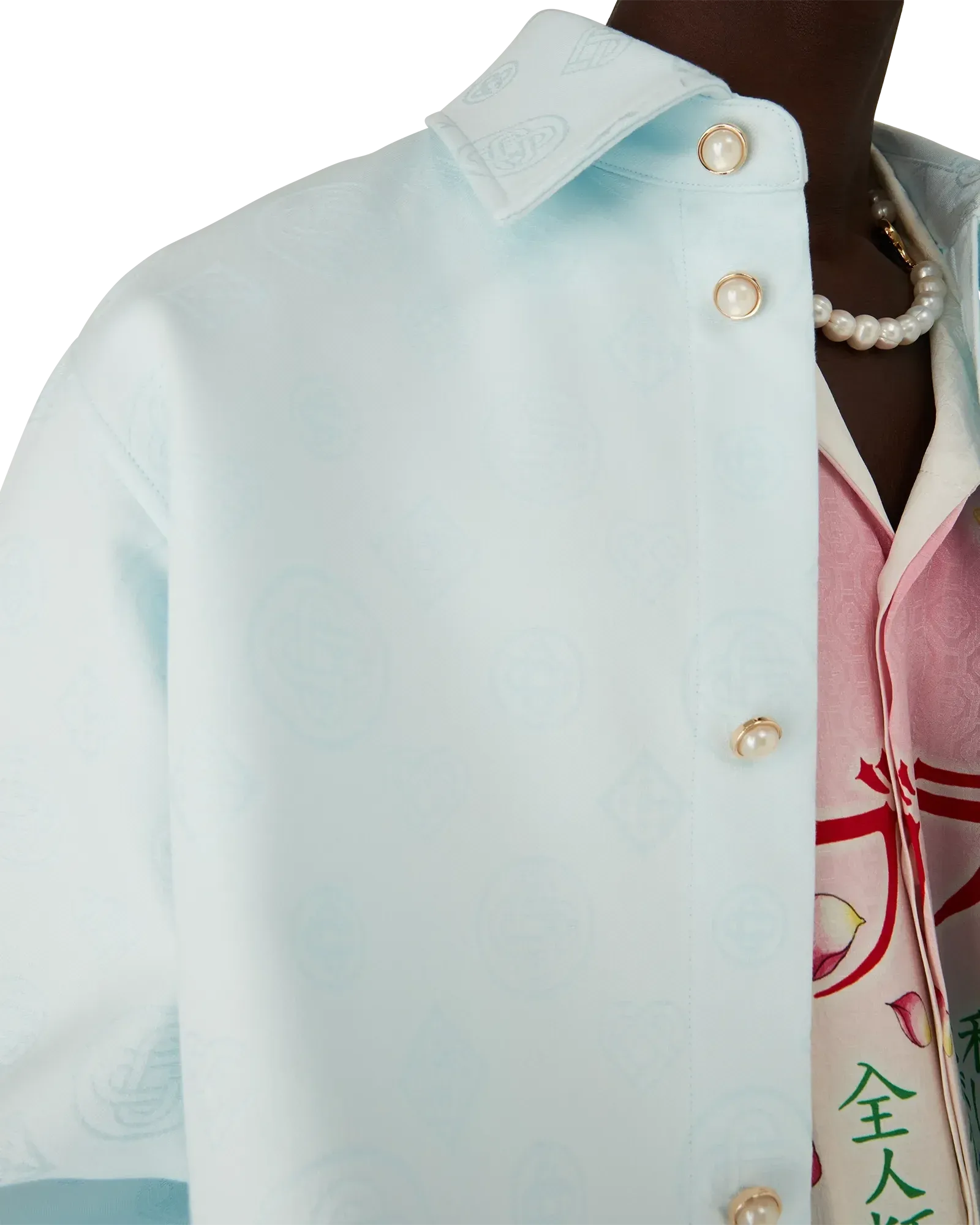 Model wearing pale blue Cotton Monogram Long Sleeve Shirt in regular fit