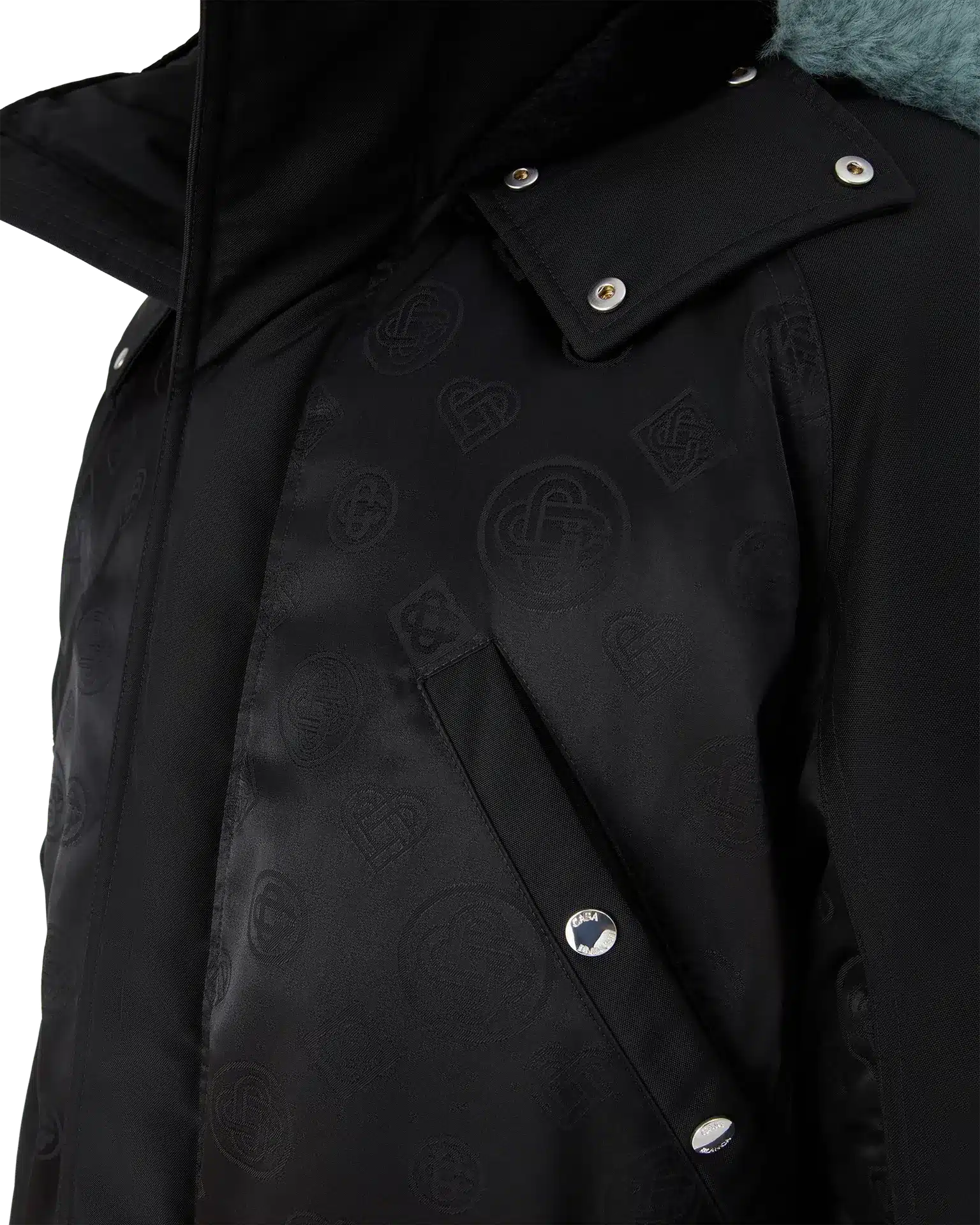 Close-up of Casablanca Nylon Parka hood with detachable faux fur trim and branded hardware