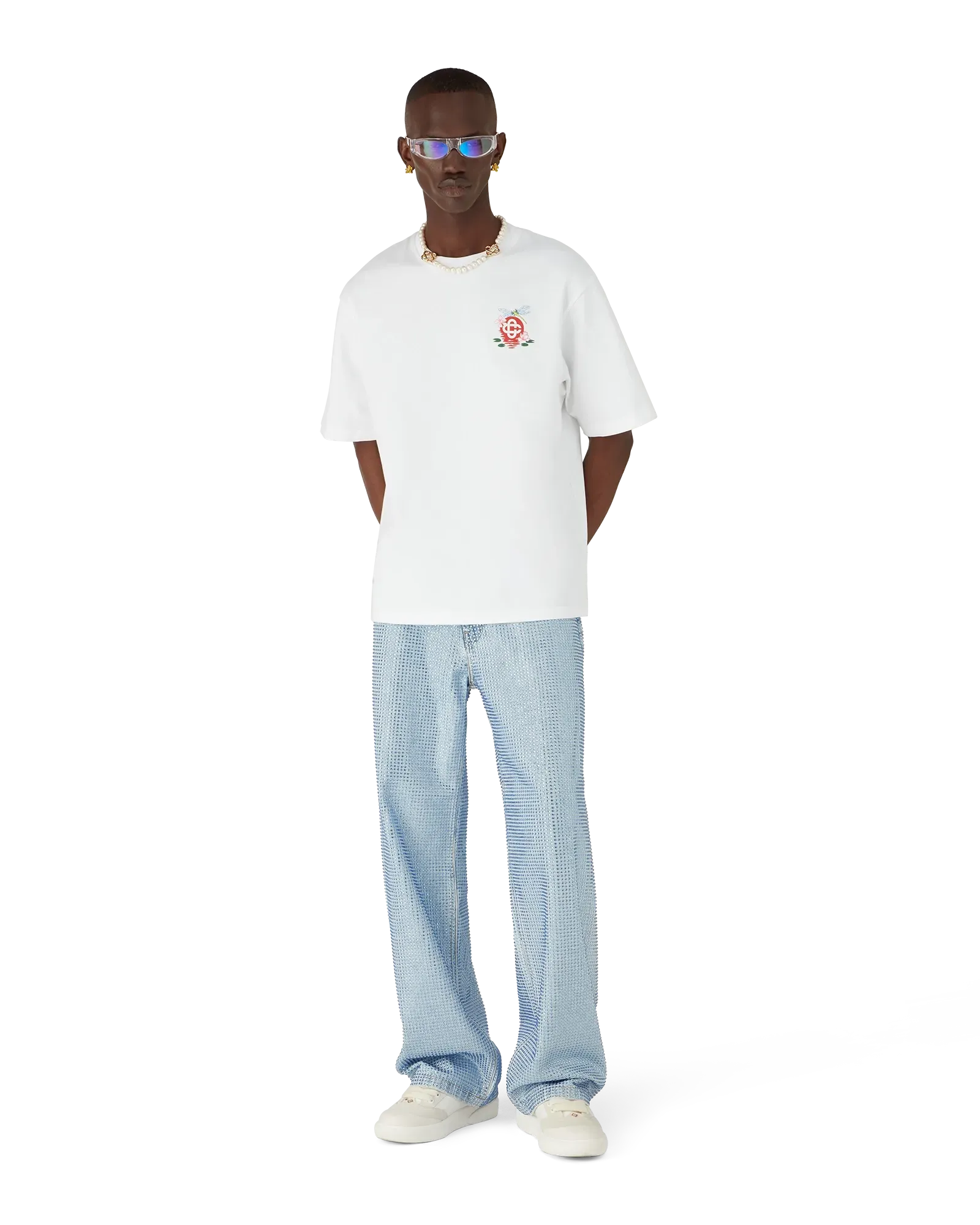 Male model styled in Casablanca Dragonfly Floral Oversized T-Shirt made from organic cotton