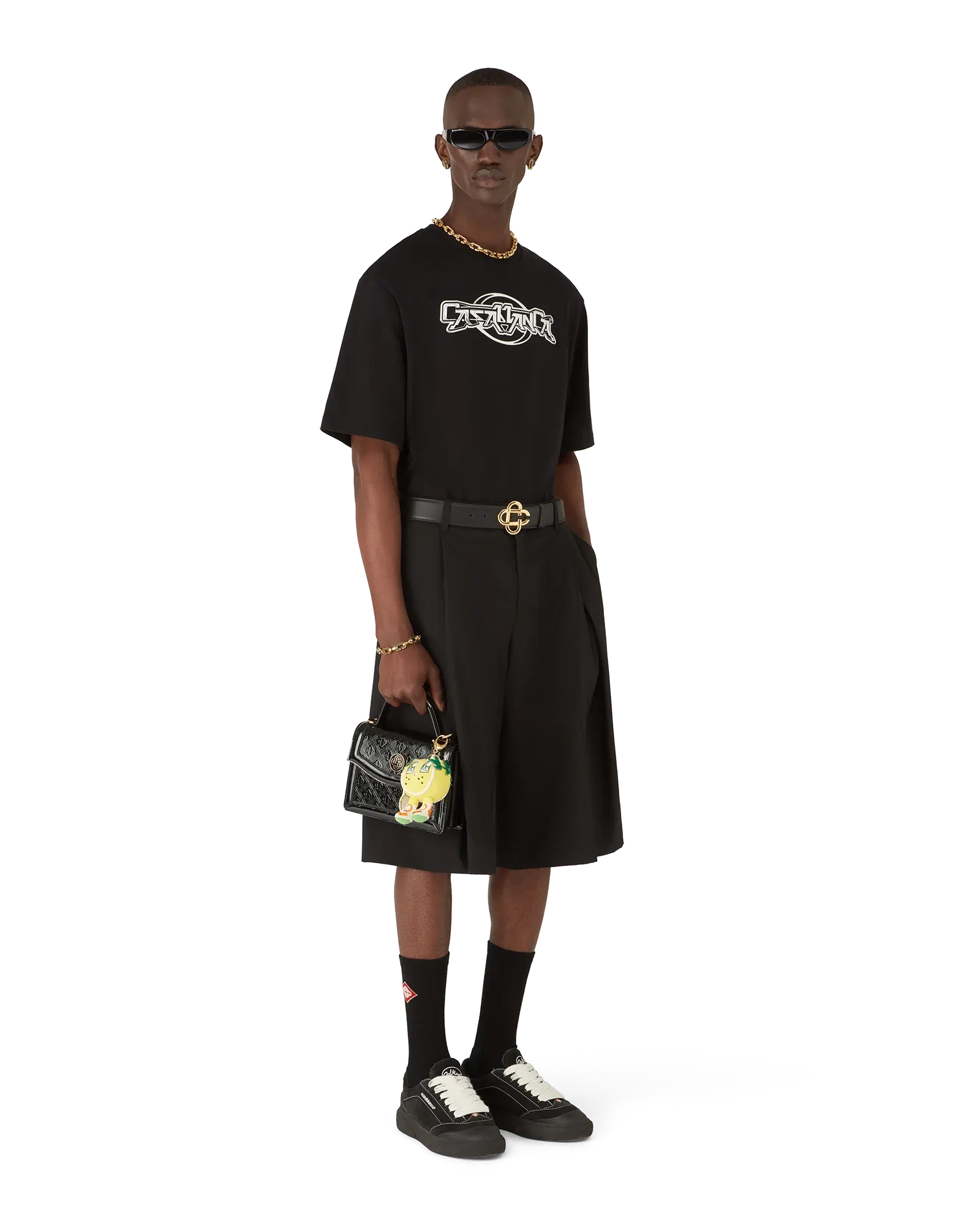 Male model styled in oversized Casablanca Chrome Short Sleeve T-Shirt in black