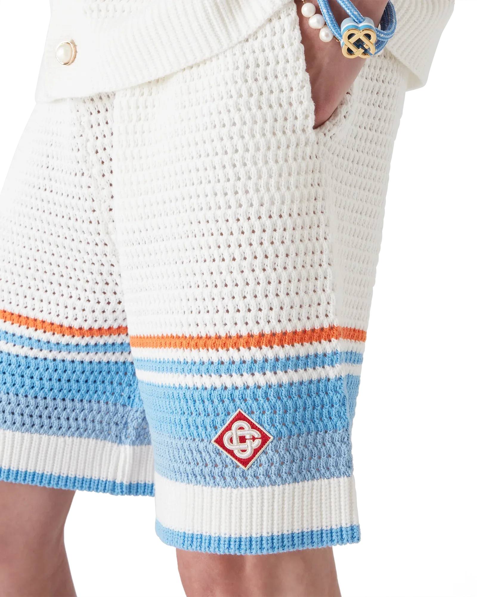 Close-up of elastic waistband and crochet cotton fabric on Cotton Tennis Crochet Shorts